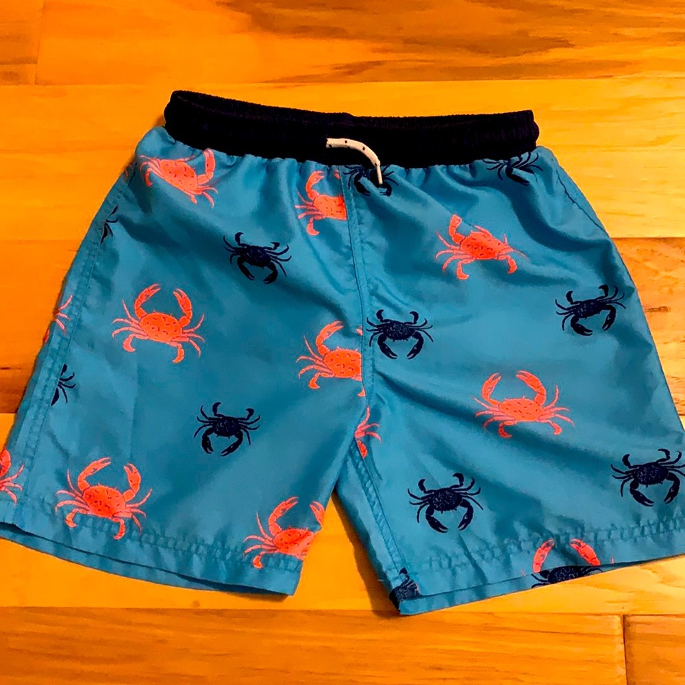 Size 8-9 swim trunks. Excellent condition.